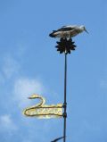 Kirchturmspitze mit Storch